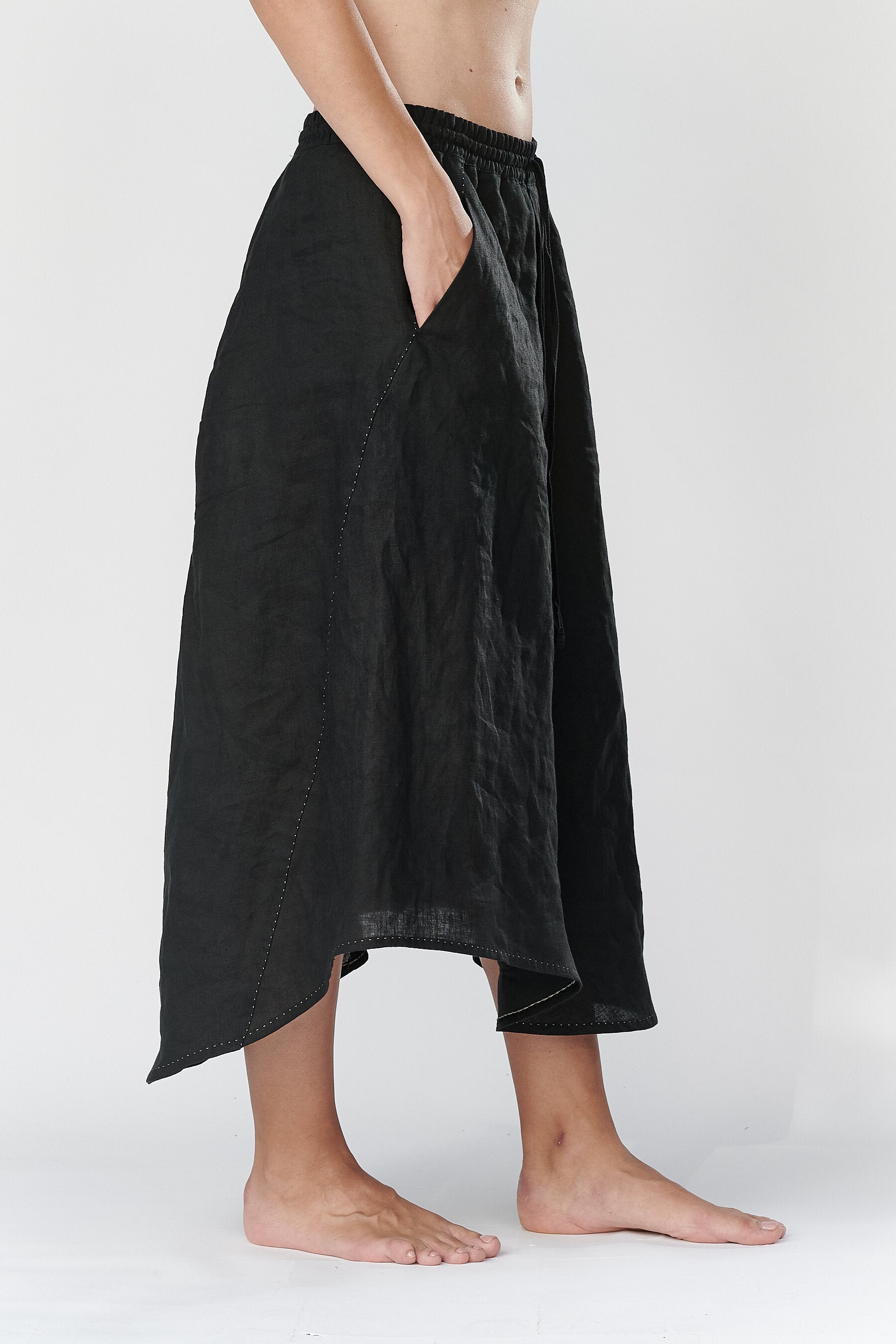 LINEN ASYMMETRICAL SKIRT WITH POCKETS