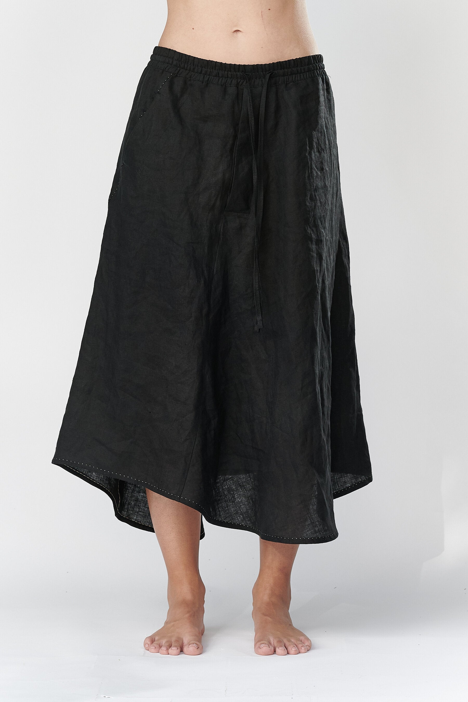 LINEN ASYMMETRICAL SKIRT WITH POCKETS