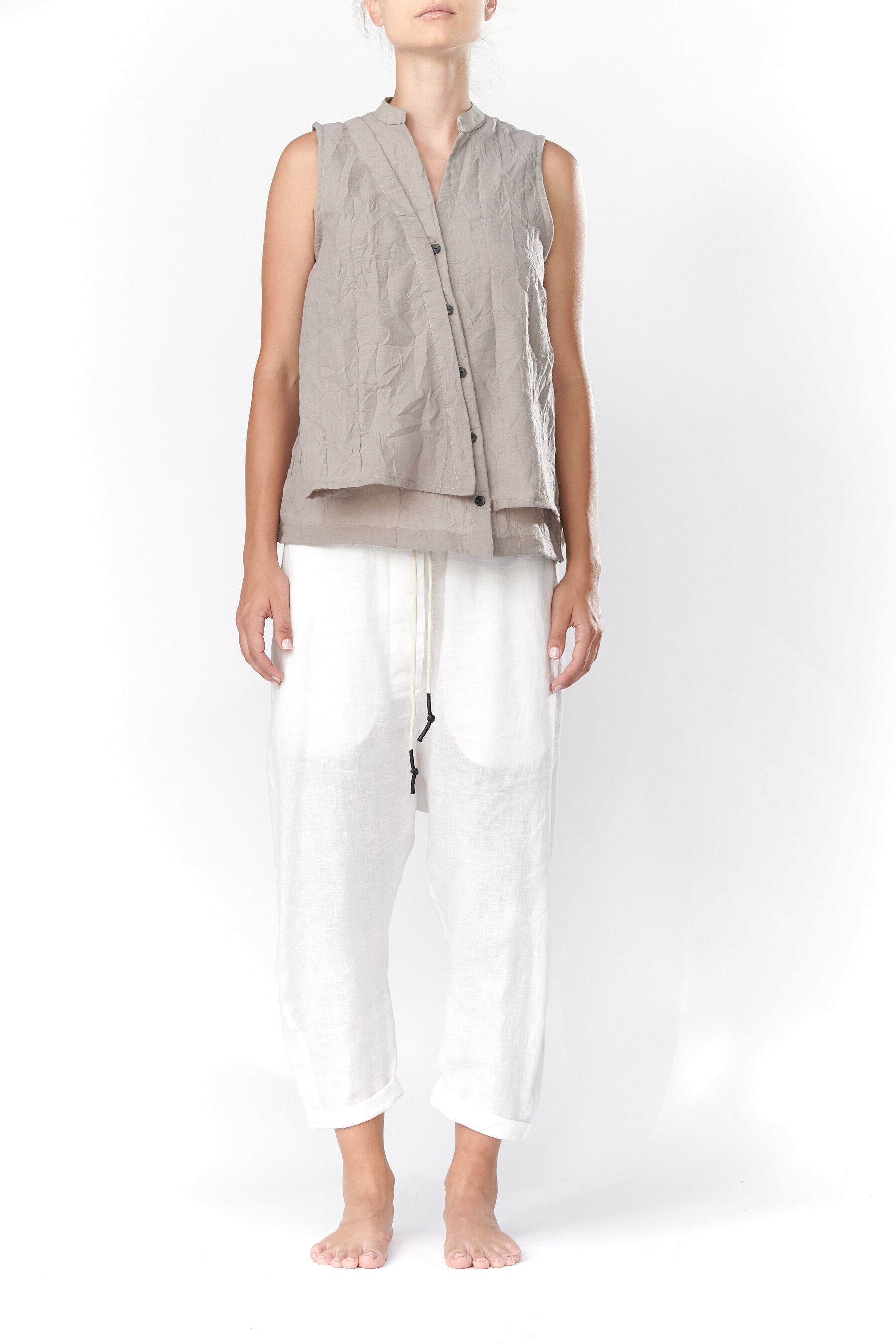 SLEEVELESS COTTON ASYMMETRICAL SHIRT